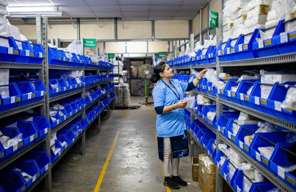 Girl sorting on warehouse storage