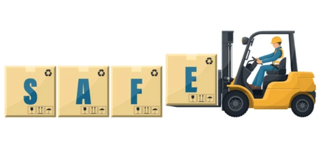 Worker driving a forklift